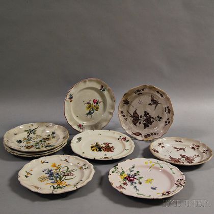 Nine Faience Floral-decorated Plates