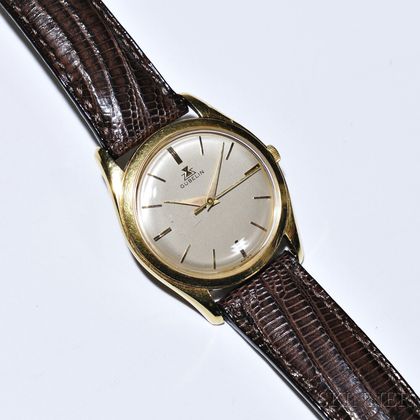 18kt Gold Gentlemans Wristwatch, Gubelin, the textured dial with baton numeral indicators, automatic movement, gold bezel and back, 35 
