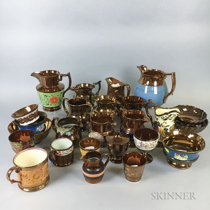 Twenty-five Copper Lustre Ceramic Vessels. Estimate $20-200