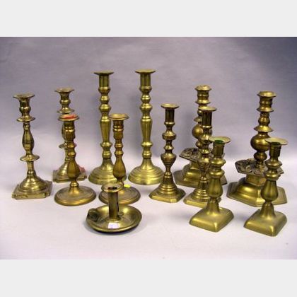 Thirteen Assorted Brass Candlesticks
