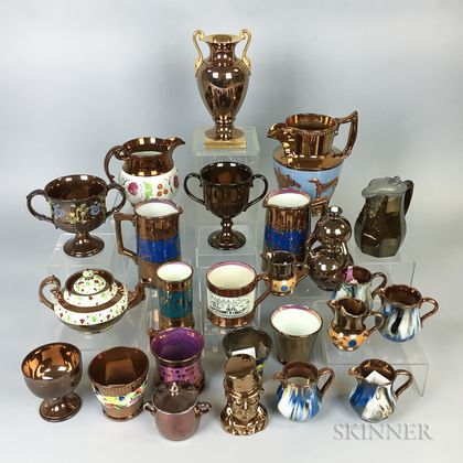 Twenty-five Pieces of Copper Lustre Ceramic Tableware. Estimate $20-200