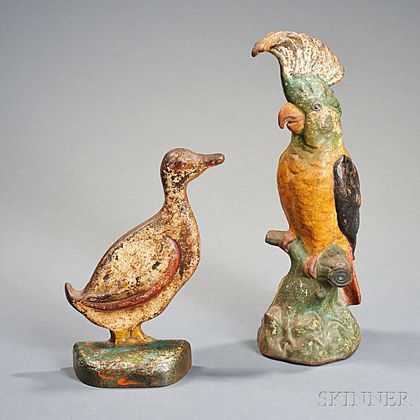 Two Painted Figural Cast Iron Doorstops