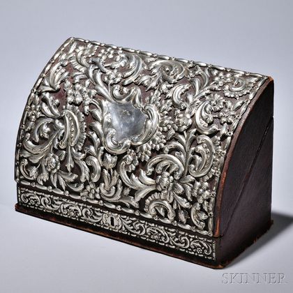Victorian Sterling Silver-mounted Letter Box, London, 1890-91, William Comyns, maker, the leather-clad box with silver-mounted floral s