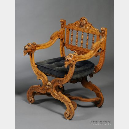 Victorian Italian Renaissance Style Upholstered Carved Walnut Armchair. 