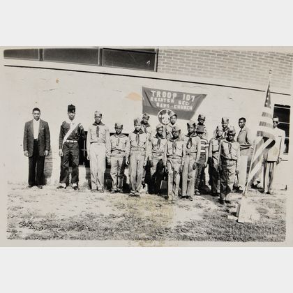 Black and White Photograph of an African American Boy Scout Troop. Estimate $100-200
