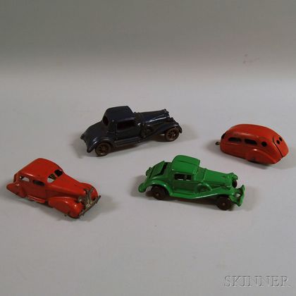 Four Toy Metal Vehicles