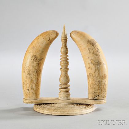 Pair of Scrimshaw-decorated Whale's Teeth on a Turned Bone Stand