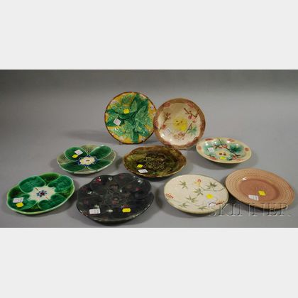 Seven Assorted Majolica Plates and Two Bowls