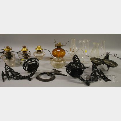 Seven Victorian Pressed Glass Kerosene Lamps with Cast Iron Wall Brackets. 