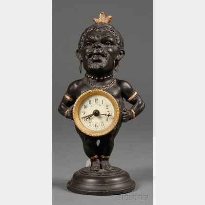 Continental Painted White Metal Figural Timepiece depicting a Zulu Warrior