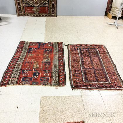 Two Rug Fragments and a Baluch Rug