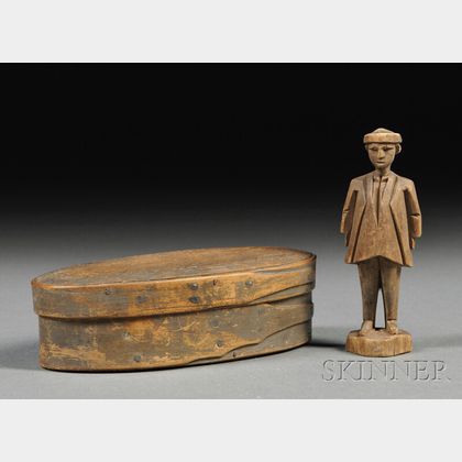 Small Painted Covered Box Containing a Carved Wooden Figure of a Man