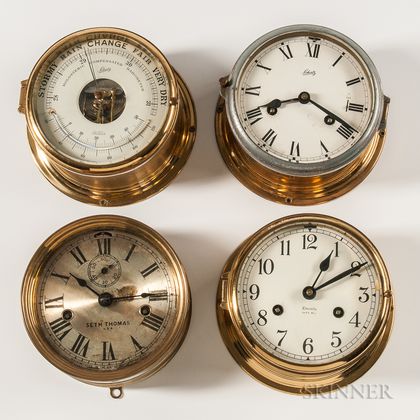 Three Brass-cased Ship's Clocks and a Barometer