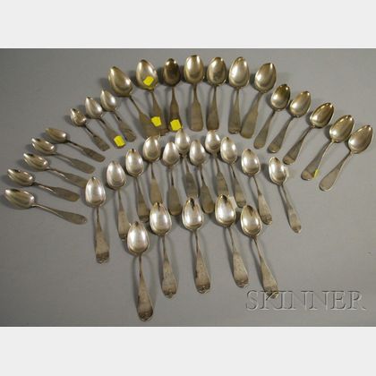 Approximately Thirty-Five Coin Silver Teaspoons and Soup Spoons