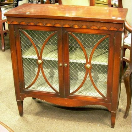 Diminutive Regency-style Mahogany Two-Door Side Cabinet with Brass Wire Panels. 