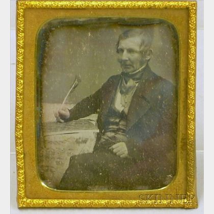 Daguerreotype Portrait of a Seated Gentleman with Quill Pen. 
