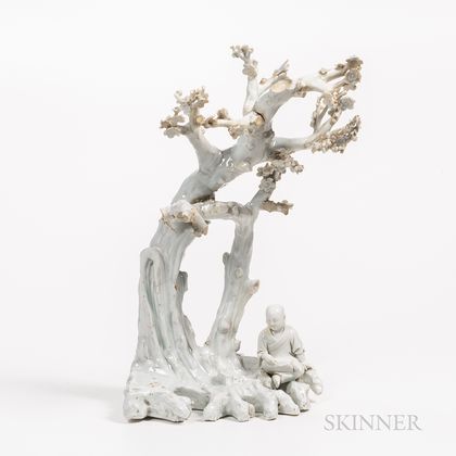 Blanc-de-Chine Sculpture of a Boy Seated Below Trees