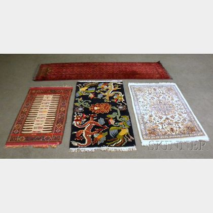 Four Oriental Rugs