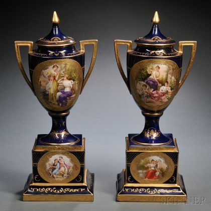Pair of Vienna Porcelain Urns and Covers