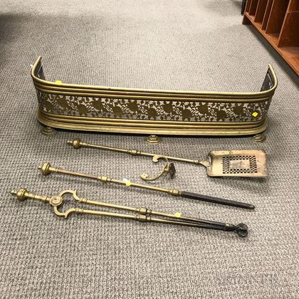 Pierced Brass Fireplace Fender, a Poker, a Shovel, and a Pair of Tongs. Estimate $200-400