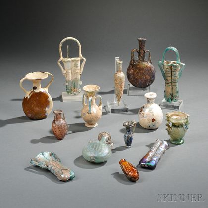 Fourteen Roman-style Glass Vessels