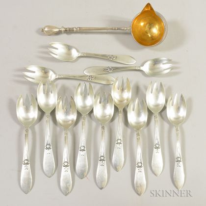 Twelve Art Nouveau Frank W. Smith Sterling Silver Ice Cream Forks and George Sharp Ladle with Gold-washed Bowl. Estimate $150-250
