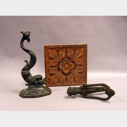 Black Painted Cast Iron Dolphin Doorstop, a Cast Iron Figural Door Knocker, and an Molded Terra-cotta Architectural Tile. 