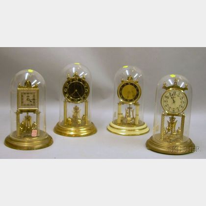 Four 400-day Torsion Pendulum Clocks