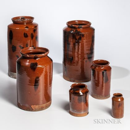 Six Graduated Cylindrical Redware Cannisters