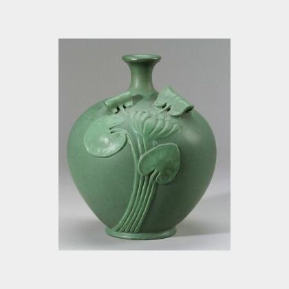 Art Pottery Matte Green Glazed Water Lily Vessel, Ohio, c. 1910, flared rim with short neck on bulbous molded body with water lily in h