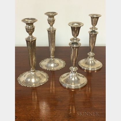 Two Pairs of Sterling Silver Weighted Candlesticks