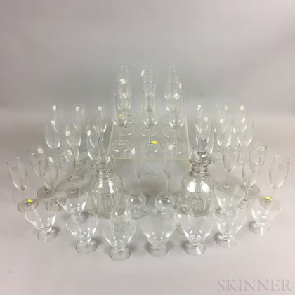 Approximately Forty-nine Pieces of Colorless Glass Tableware. Estimate $20-200