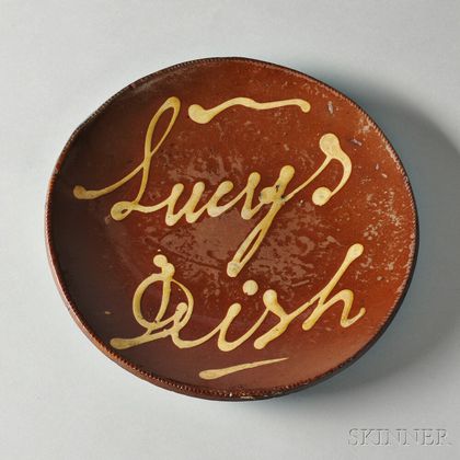 Redware Plate with Yellow Slip Inscription "Lucys Dish,"