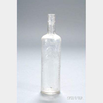 Four Assorted 19th and 20th Century Colored and Colorless Molded and Blown Glass Bottles