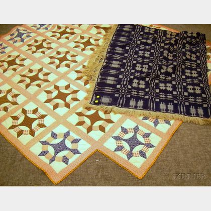 Hand-stitched Pieced Cotton Star Pattern Quilt and a Blue and White Wool and Linen Pine Tree and Snowflake Patt... 