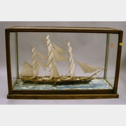 Cased Carved and Painted Wooden Model of the Cutty Sark
