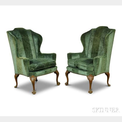 Pair of Chippendale-style Carved and Upholstered Mahogany Wing Chairs.