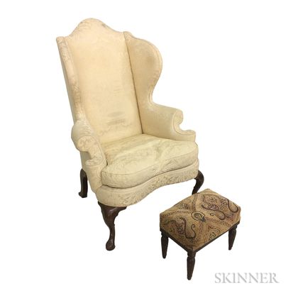 Queen Anne-style Upholstered Walnut Wing Chair and a Regency Mahogany Footstool