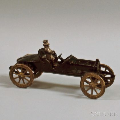 Small Black-painted Cast Iron Toy Car with Seated Metal Driver