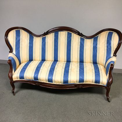 Rococo Revival Carved and Upholstered Walnut Sofa