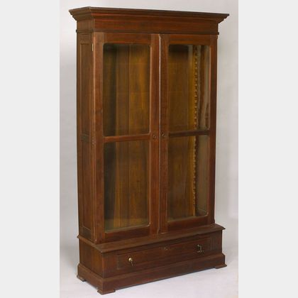Victorian Glazed Walnut Two-Door Book Cabinet over Long Drawer. 
