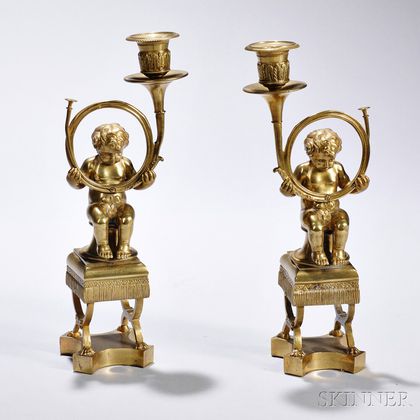 Pair of Brass Figural Candlesticks