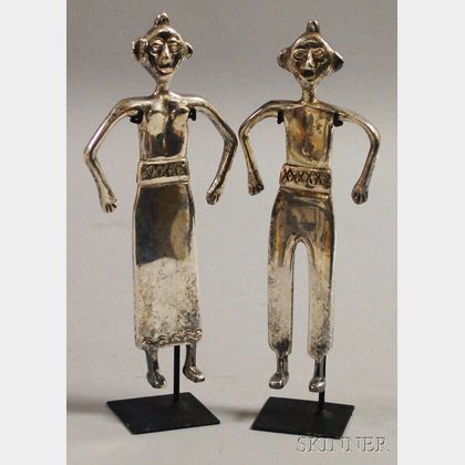 Pair of Ethnographic Silvered Cast Metal Fetish Figures of a Man and Woman