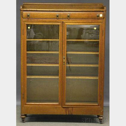 Early 20th Century Carved Oak Two-door Book Cabinet