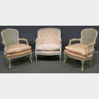 Pair of Louis XVI-style Upholstered Painted Carved Wood Fauteuils and a Bergere. 
