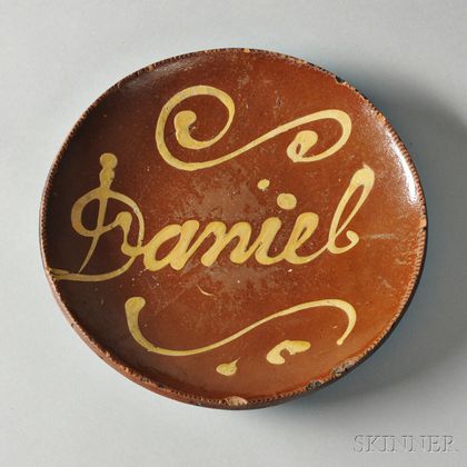 Redware Plate with Yellow Slip Inscription "Daniel,"