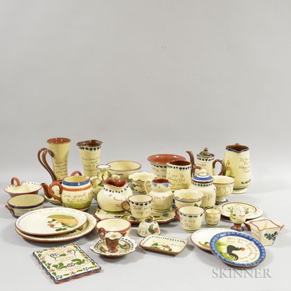 Thirty-four Mostly Watcombe Torguay Pottery Mottoware Items.