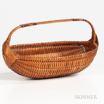 Woven Basket with Carved Wood Handle