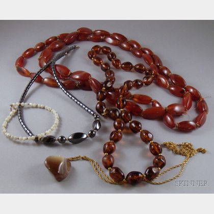 Amber Beaded Necklace, an Agate Beaded Necklace, an Agate Pendant Necklace, and a Hematite Beaded Necklace.... 
