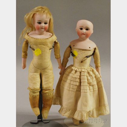 Two Closed Mouth German Bisque Shoulderhead Dolls